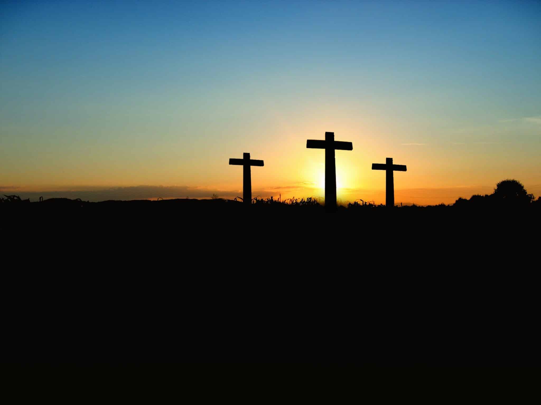 3 Christian crosses at dawn
